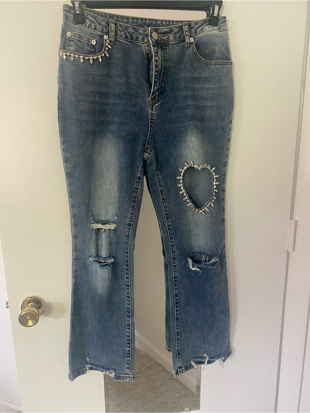 Women's Blue Distressed Ankle Jeans with Heart Cutout and Stud Trim